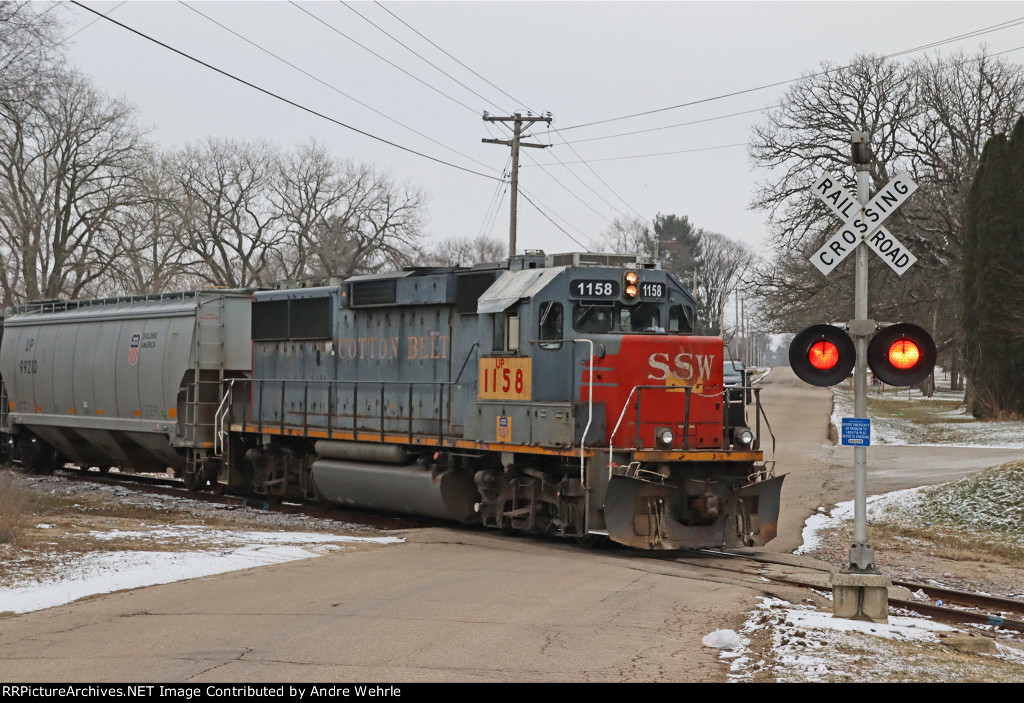 The ex-SSW 9644 follows the train across Colley Road